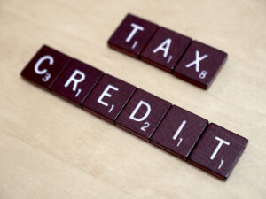 This is a picture of tiles that spell Tax Credit.