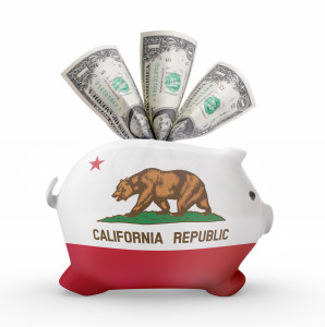 Side view of a piggy bank with the flag design of California.