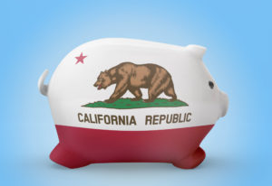 side view of a piggy bank with the flag design of California.