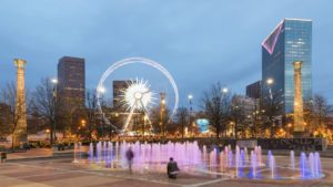 Centennial Olympic Park and surrounding buildings in Atlanta at night