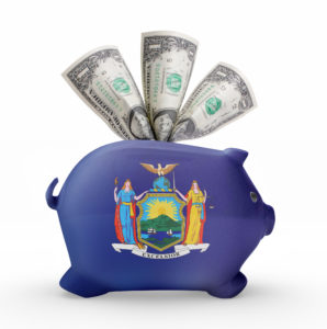 Side view of a piggy bank with the flag design of New York.