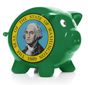 Piggy bank with flag coating over it isolated on white - state of Washington