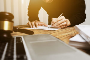 Young businessman working hard alone in his office.