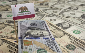 This is a picture of the CA flag and $1 bills. 