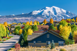Residential neighborhood in Colorado at autumn, USA. Mount Sopris landscape.